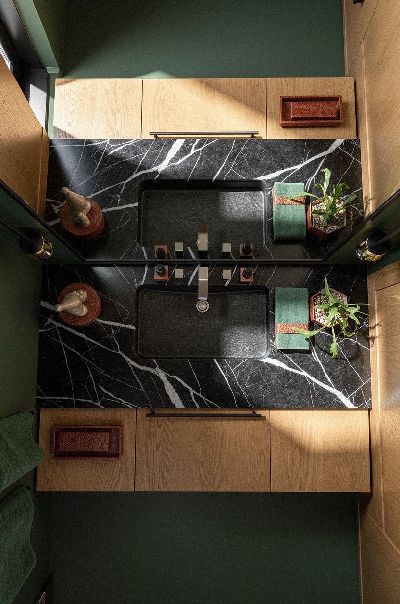 Layer Nero Marquina Behind the Vanity