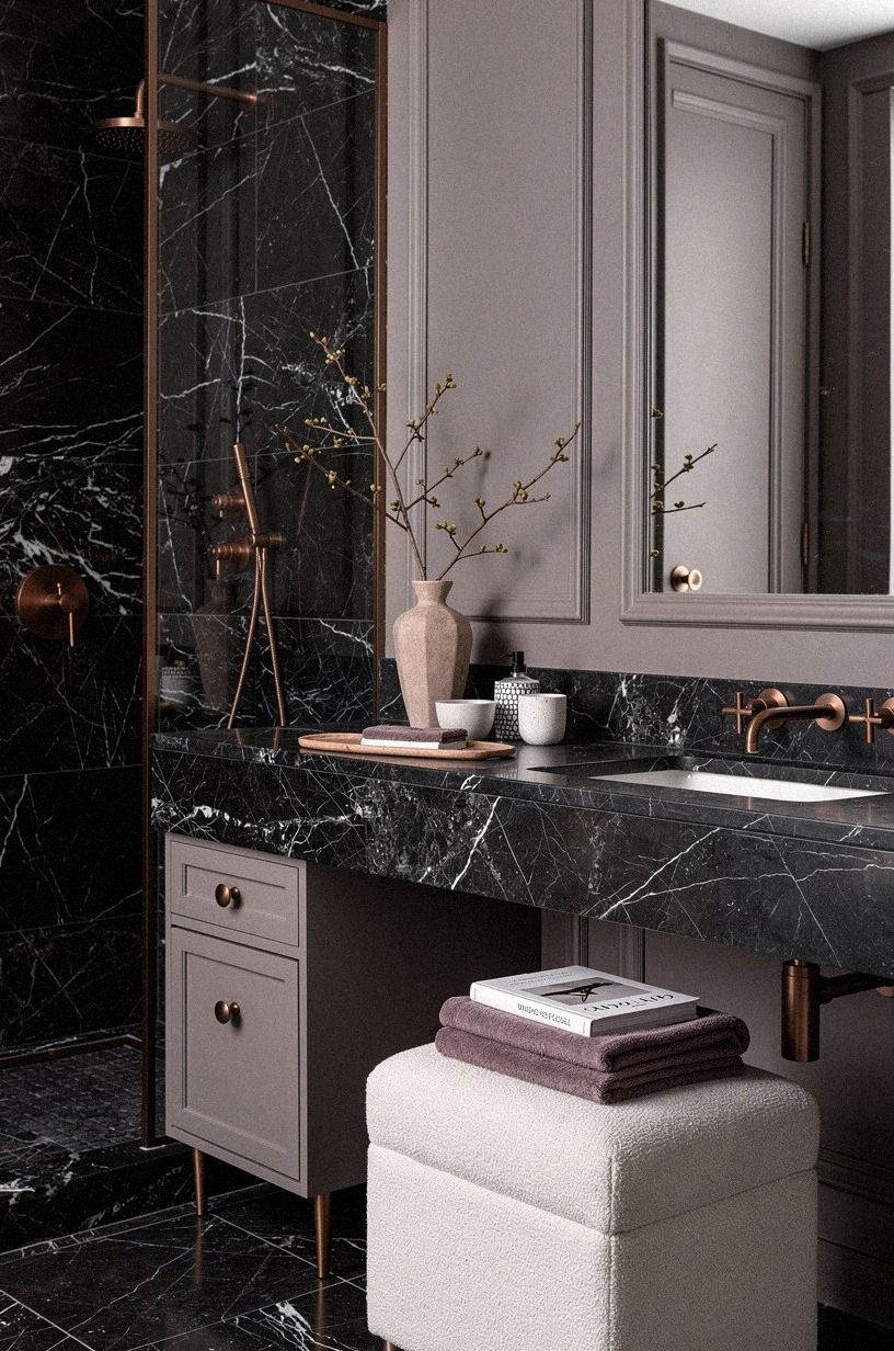 Let Aged Bronze Warm a Nero Marquina Room