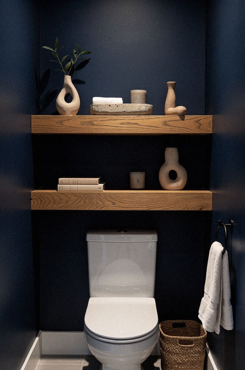Float a chunky oak shelf above the toilet