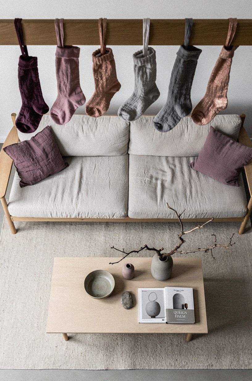 Hang stockings from a sturdy wooden rail