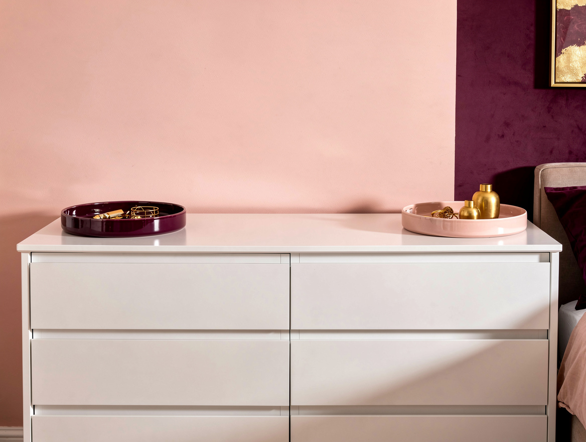 Realistic editorial medium-shot photo of a wide white six-drawer dresser in a co