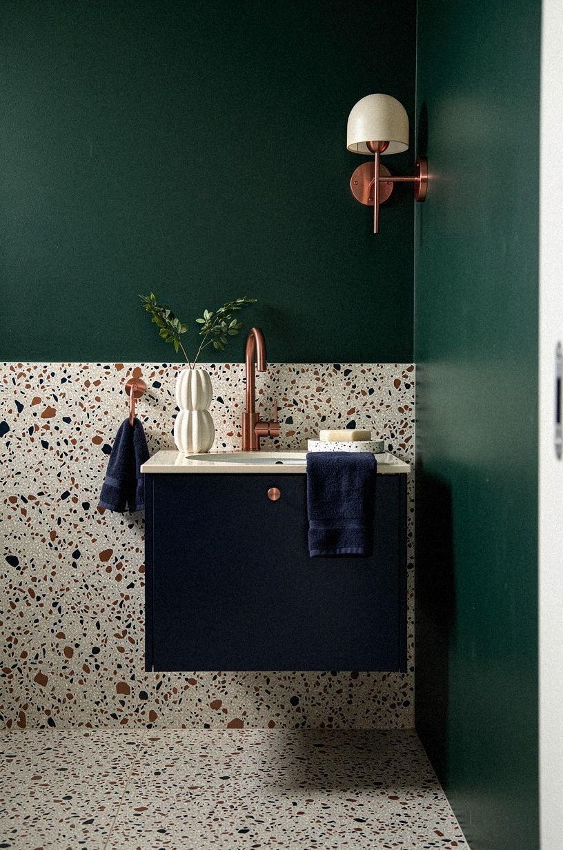 Why does a tiny powder room handle dark green?