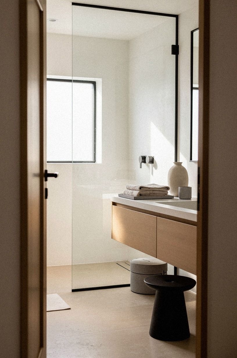 Frame the water with a frameless panel, not a curtain