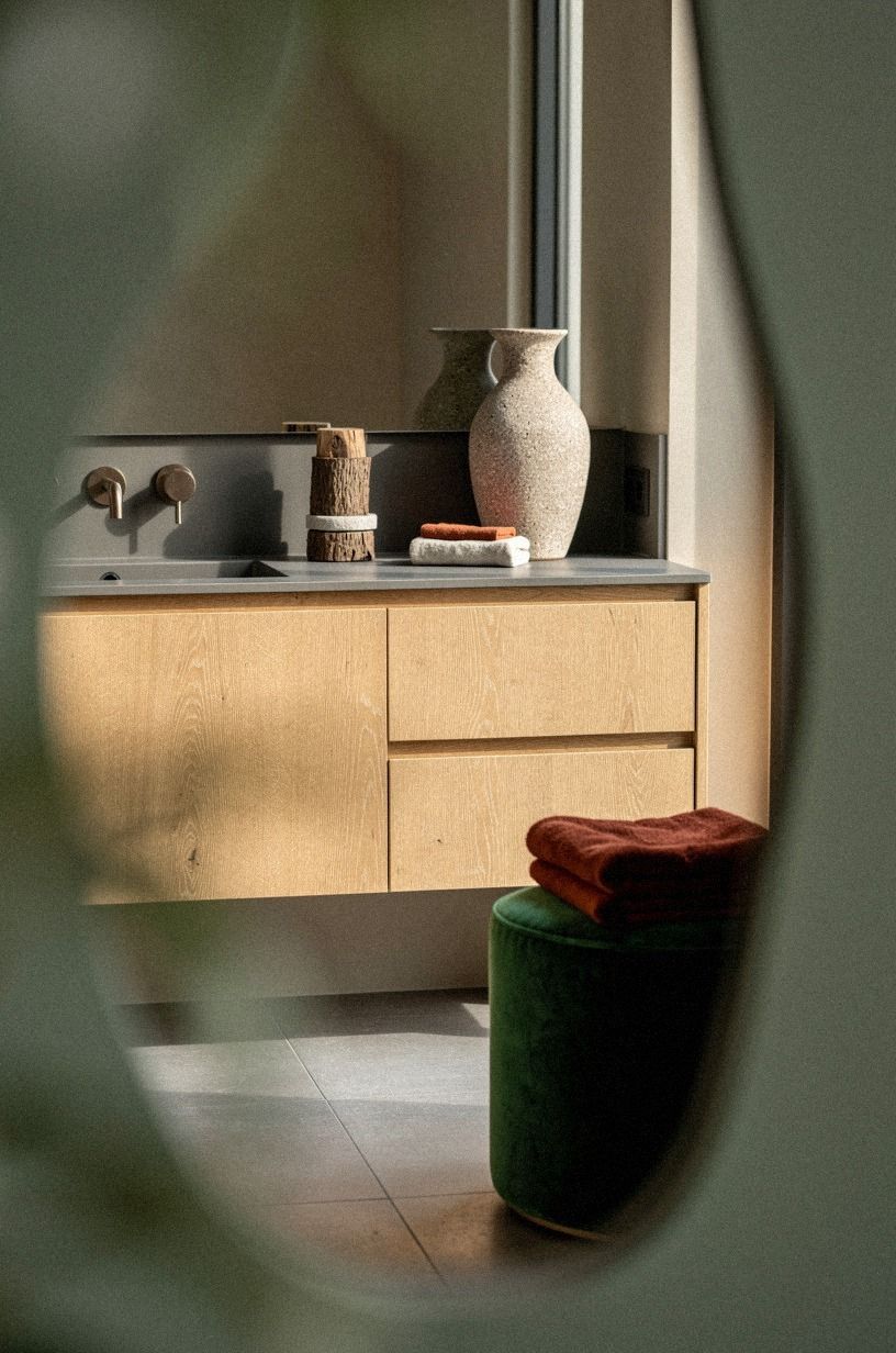 Choose wood over another white cabinet