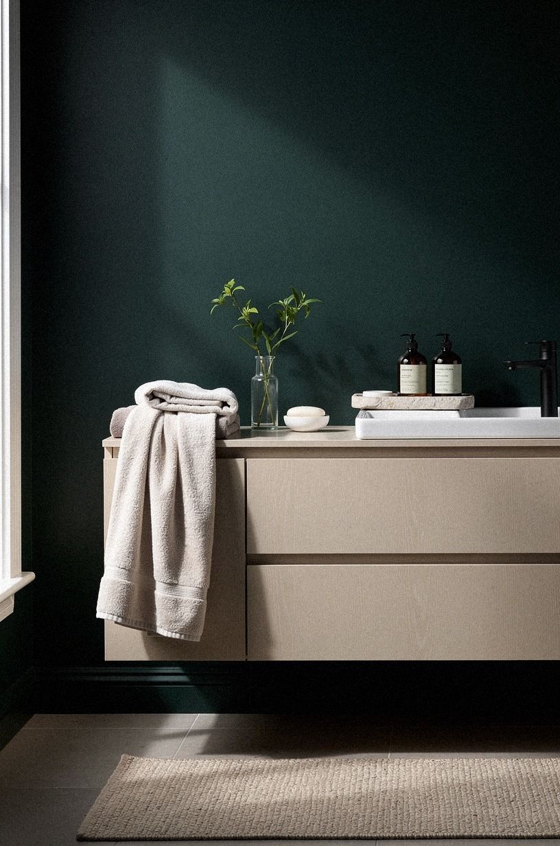 Soften the walls with washable textiles