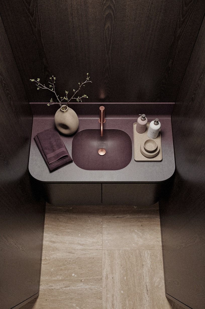 Why does a dark wood powder room feel calmer?