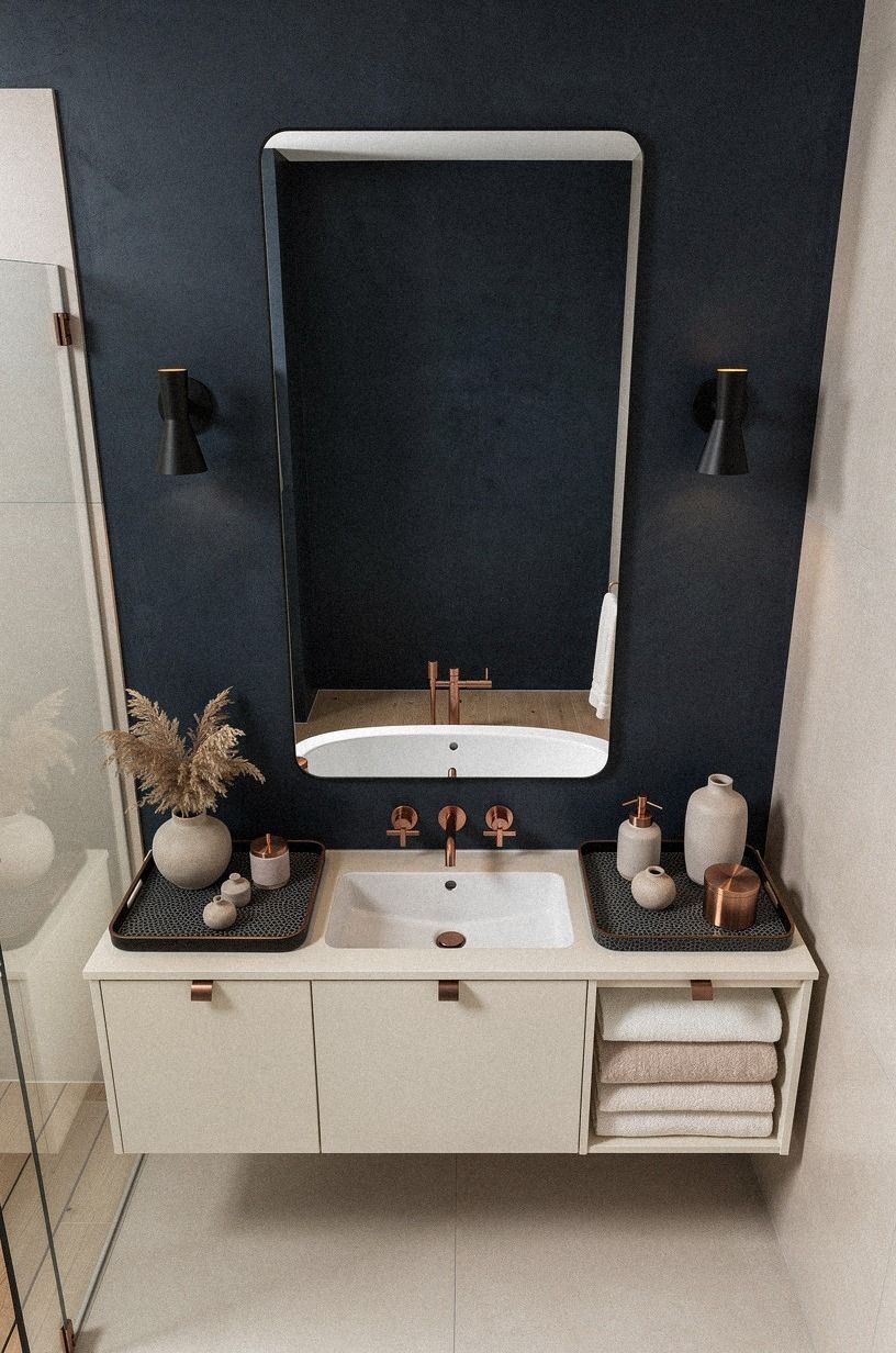 Hang black sconces beside the mirror